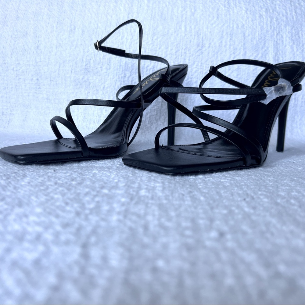 Black strappy 3 inch heels.
